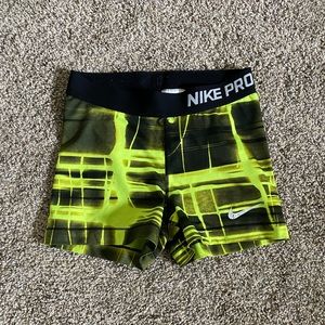 black and neon nike pros